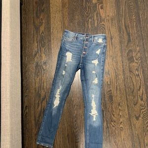 High rise button up distressed denim jeans